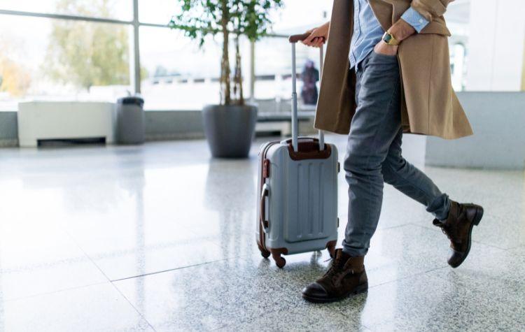 A business traveler walking