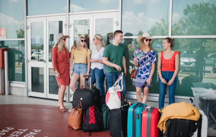 A group of people that just arrived off a plane