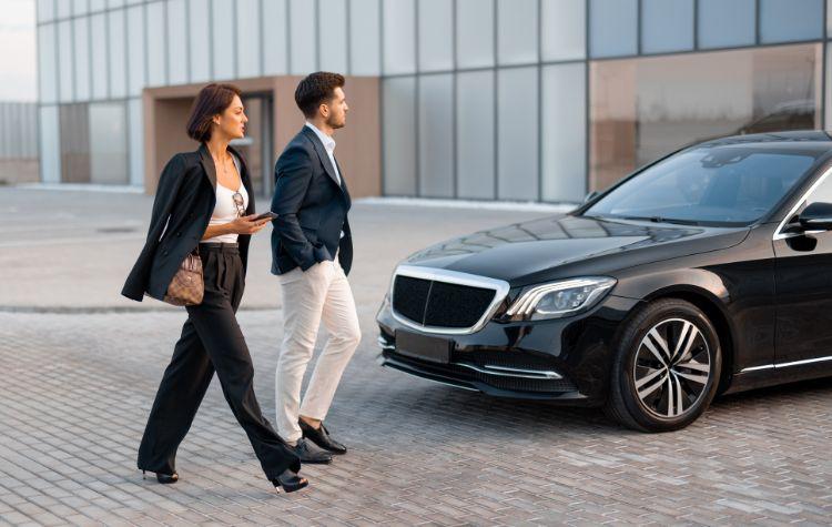 A woman walking to her luxury pickup