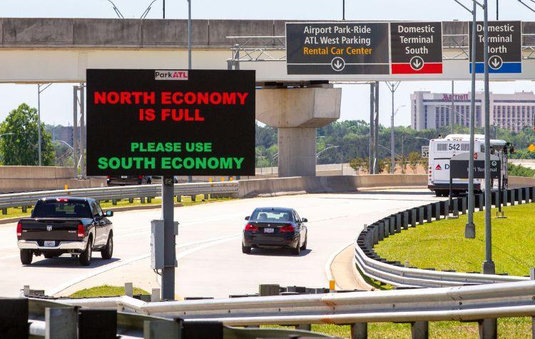 ATL Parking Lot Full- Image Credit: https://www.ajc.com/news/business/amid-parking-crunch-hartsfield-jackson-opens-new-park-ride-lot/4RXWKNY6OJGOBNBYAWN7VZ2LDQ/