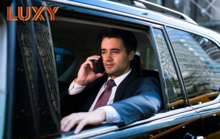 Man in his black car airport transfer