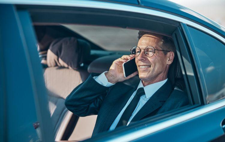 Passenger in their black car ride to the airport