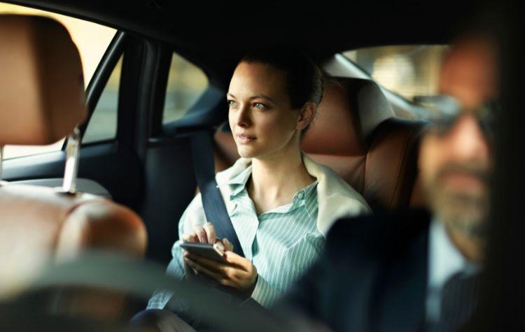 Passenger in their black car ride