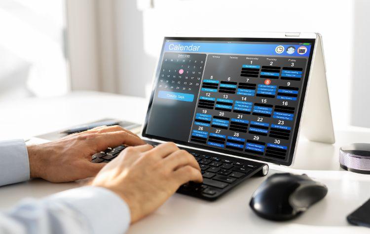 Person typing out a schedule