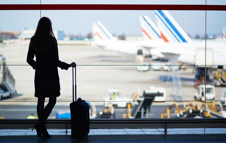 Person waiting at an airport for her flight