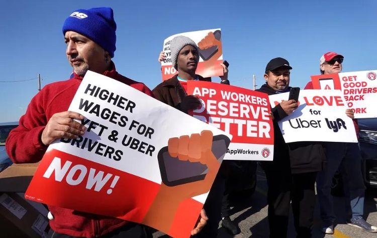 Rideshare drivers striking on 2.14.24 (Image credit: https://www.vox.com/politics/2024/2/14/24073382/lyft-uber-strike-valentines-day-2024)