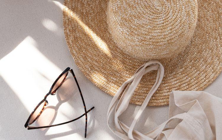 Sunglasses and a beach hat