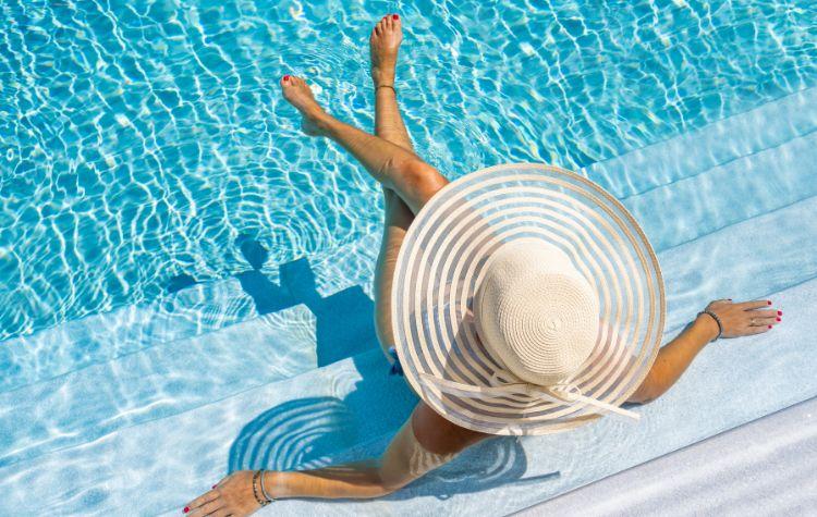 Woman relaxing in a pool