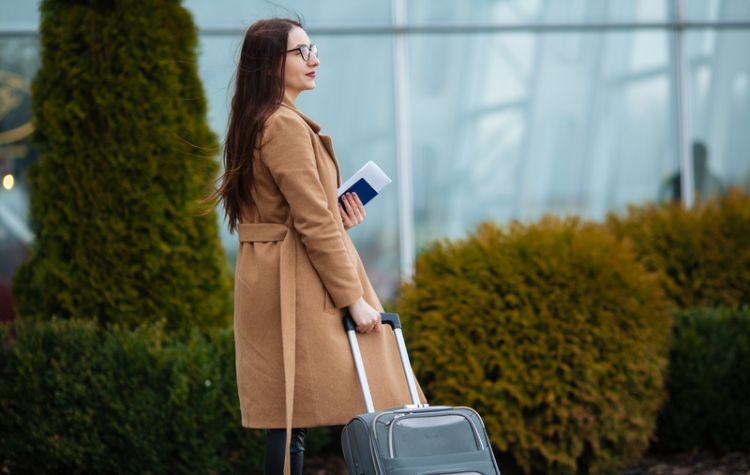 Woman walking with luggage